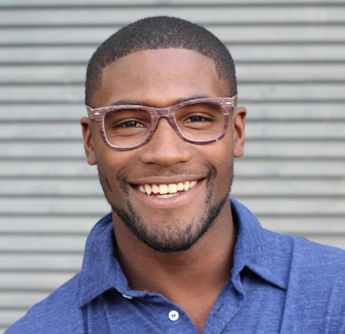 Buda patient smiling with dental implants